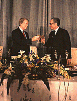 President Jimmy Carter offers a toast to Mohammed Reza Shah Pahlavi, calling Iran 'an island of stability in one of the more troubled areas of the world.' President Jimmy Carter offers a toast to Mohammed Reza Shah Pahlavi, calling Iran 'an island of stability in one of the more troubled areas of the world.'