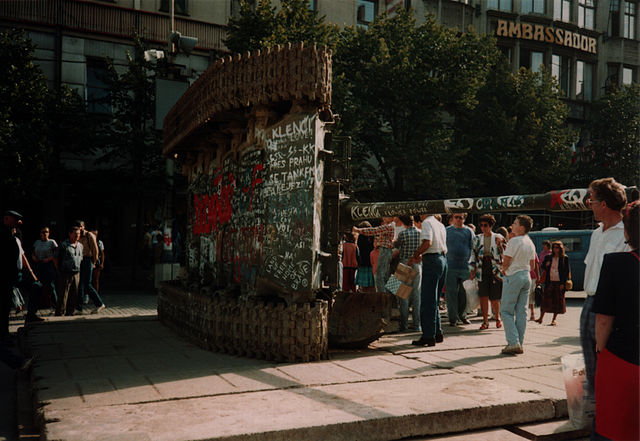 The logo of Solidarność painted on an overturned Soviet era T-55.
