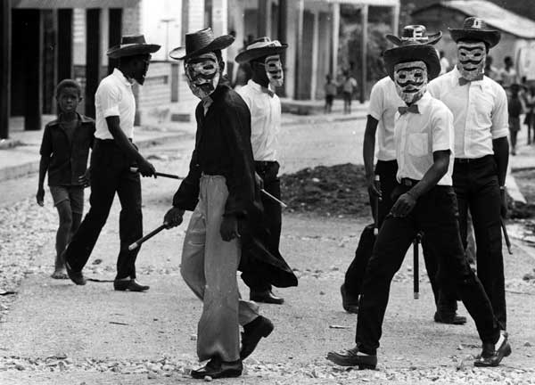 Tonton macoutes patrolling a Haitian street, 1988.