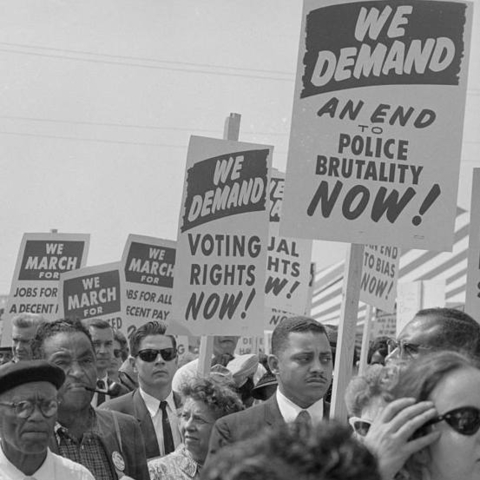 Demonstrators at the civil rights march on Washington, D.C. demand an end to police violence, August 28, 1963