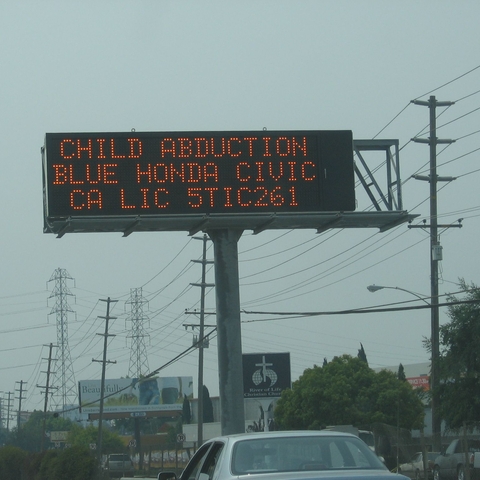 An electronic traffic-condition sign displaying an AMBER Alert. An electronic traffic-condition sign displaying an AMBER Alert.