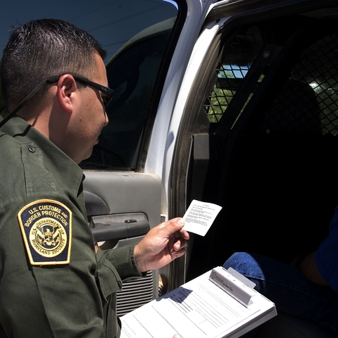 A U.S. Border Patrol agent reads Miranda rights to a Mexican national arrested for transporting drugs A U.S. Border Patrol agent reads Miranda rights to a Mexican national arrested for transporting drugs